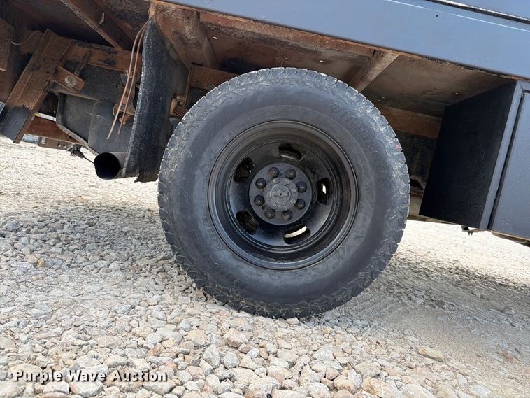 image for item FK3409 2012 Dodge  Ram 3500HD Crew Cab flatbed pickup truck