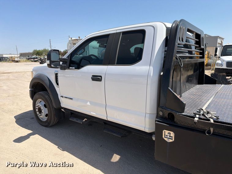 image for item MZ9909 2017 Ford F550 Super Duty XL Ext. Cab flatbed truck