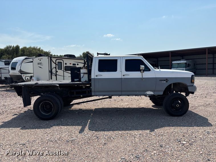 image for item NM9923 1995 Ford F350 Crew Cab flatbed pickup truck