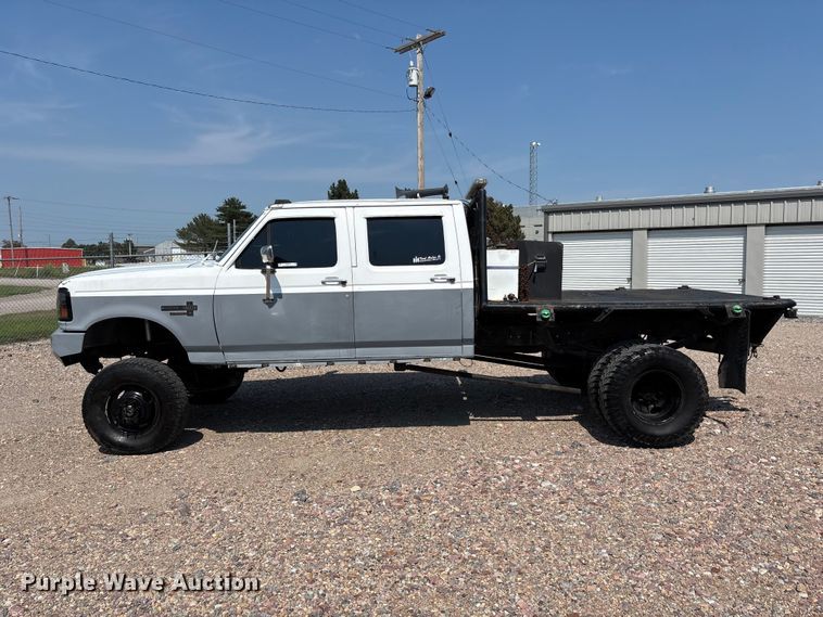 image for item NM9923 1995 Ford F350 Crew Cab flatbed pickup truck