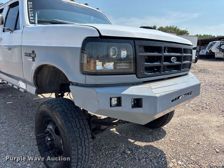 image for item NM9923 1995 Ford F350 Crew Cab flatbed pickup truck