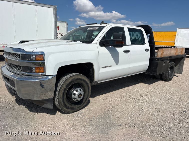 image for item YA4623 2019 Chevrolet Silverado 3500HD Crew Cab flatbed pickup truck