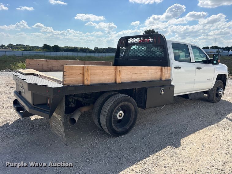 image for item YA4623 2019 Chevrolet Silverado 3500HD Crew Cab flatbed pickup truck