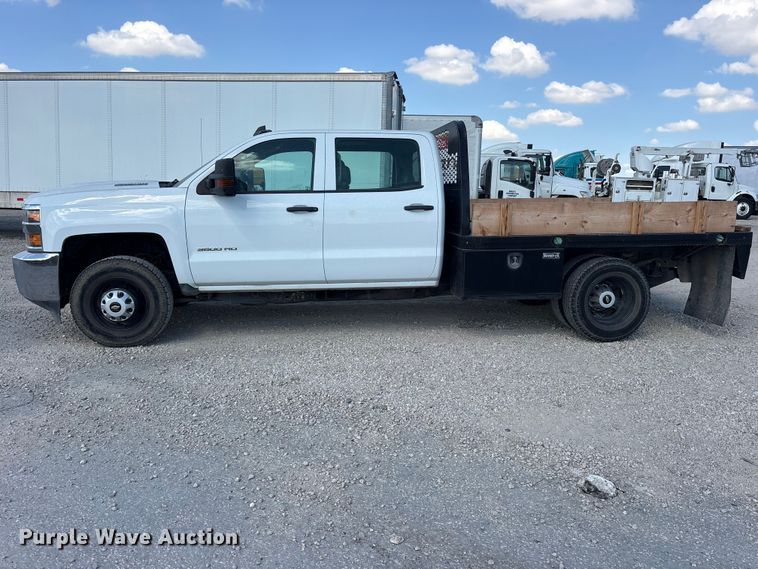 image for item YA4623 2019 Chevrolet Silverado 3500HD Crew Cab flatbed pickup truck