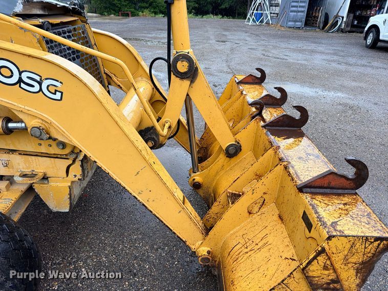image for item DU1547 2006 John Deere 310SG backhoe