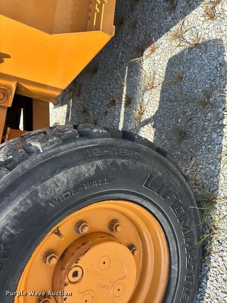 image for item ER3253 1996 Case 570 LXT landscape tractor