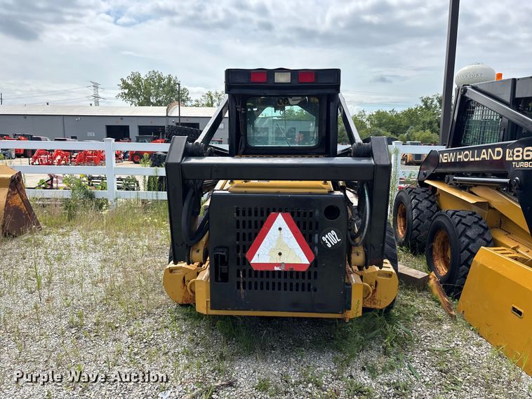 image for item ER3256 1996 New Holland LX 885 skid steer loader