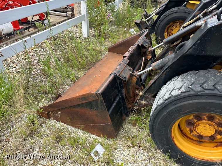image for item ER3256 1996 New Holland LX 885 skid steer loader