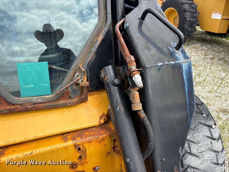 image for item ER3256 1996 New Holland LX 885 skid steer loader