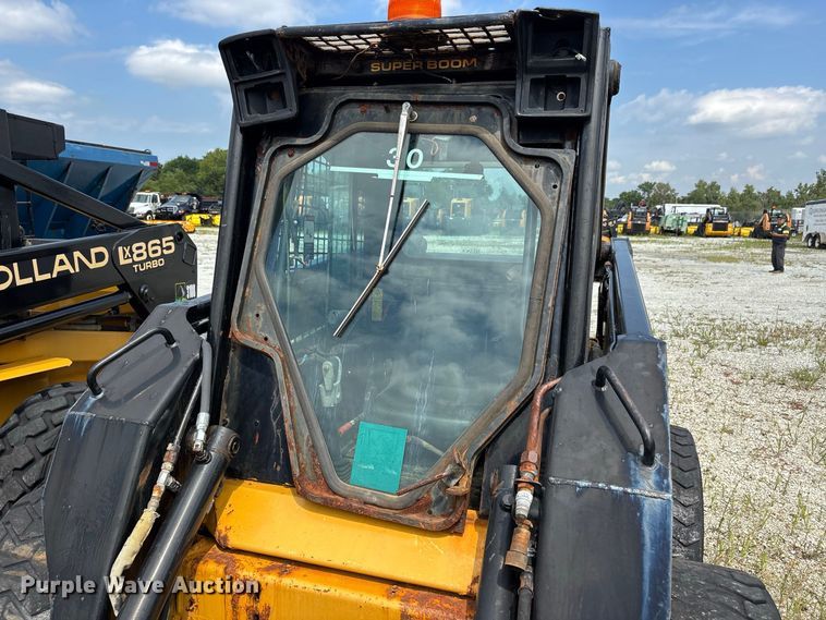image for item ER3256 1996 New Holland LX 885 skid steer loader