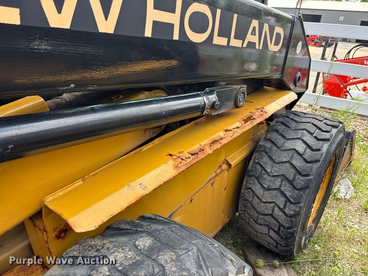 image for item ER3256 1996 New Holland LX 885 skid steer loader