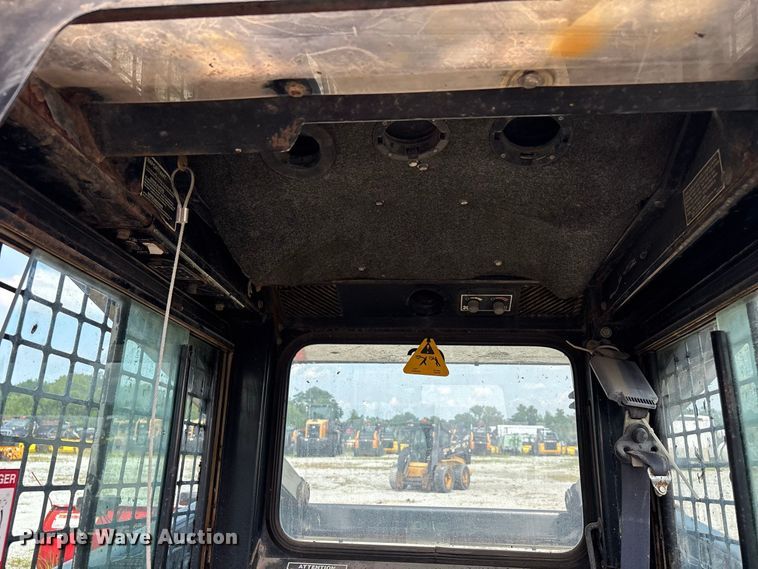 image for item ER3256 1996 New Holland LX 885 skid steer loader