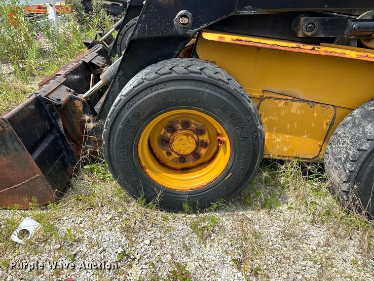 image for item ER3256 1996 New Holland LX 885 skid steer loader