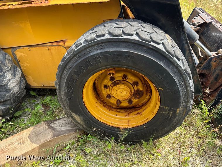 image for item ER3256 1996 New Holland LX 885 skid steer loader