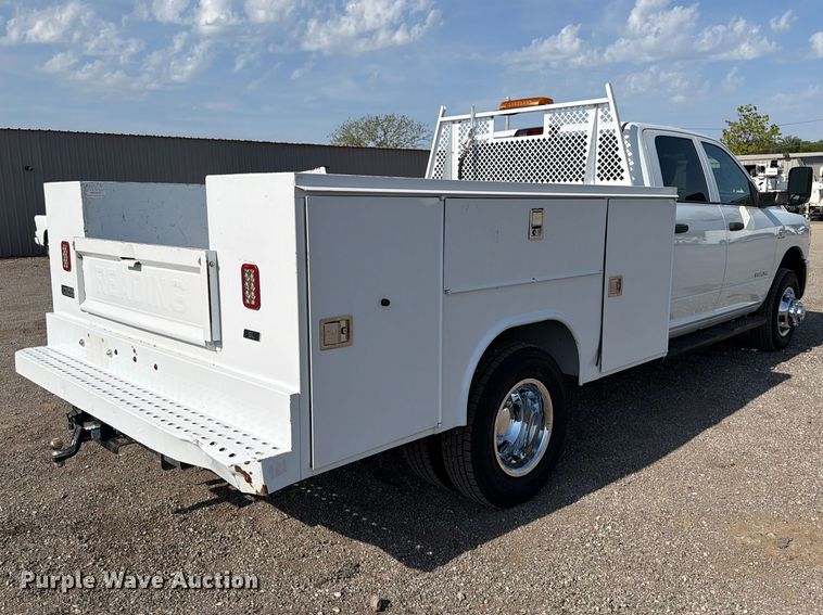 image for item FB5058 2019 RAM 3500 Heavy Duty Crew Cab utility bed pickup truck