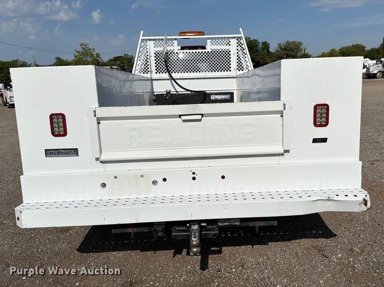 image for item FB5058 2019 RAM 3500 Heavy Duty Crew Cab utility bed pickup truck