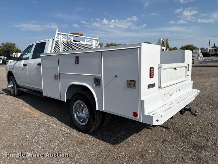 image for item FB5058 2019 RAM 3500 Heavy Duty Crew Cab utility bed pickup truck