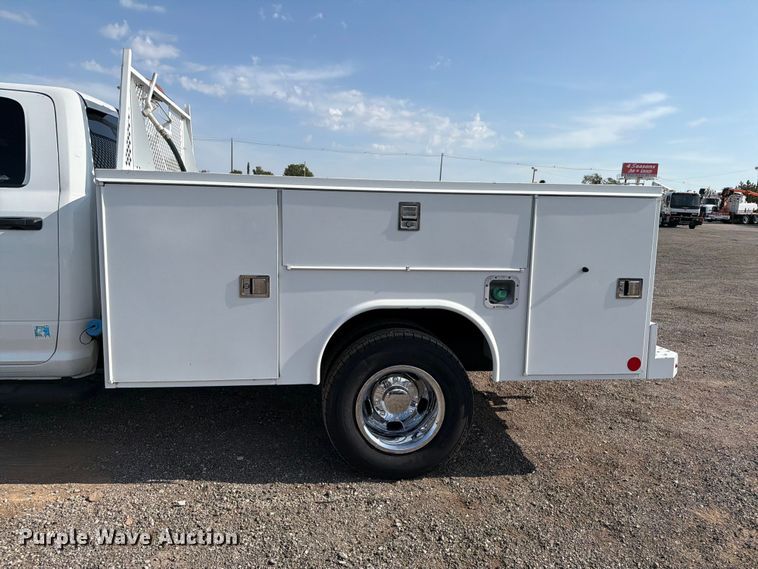 image for item FB5058 2019 RAM 3500 Heavy Duty Crew Cab utility bed pickup truck