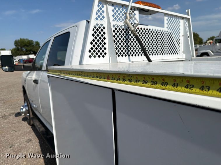 image for item FB5058 2019 RAM 3500 Heavy Duty Crew Cab utility bed pickup truck