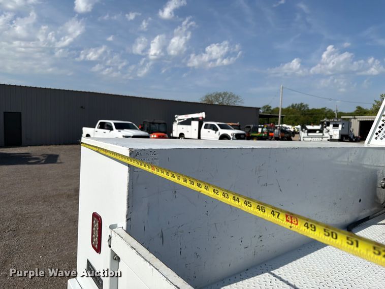 image for item FB5058 2019 RAM 3500 Heavy Duty Crew Cab utility bed pickup truck