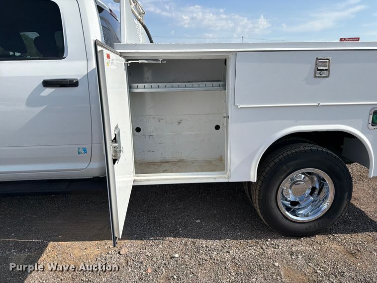 image for item FB5058 2019 RAM 3500 Heavy Duty Crew Cab utility bed pickup truck