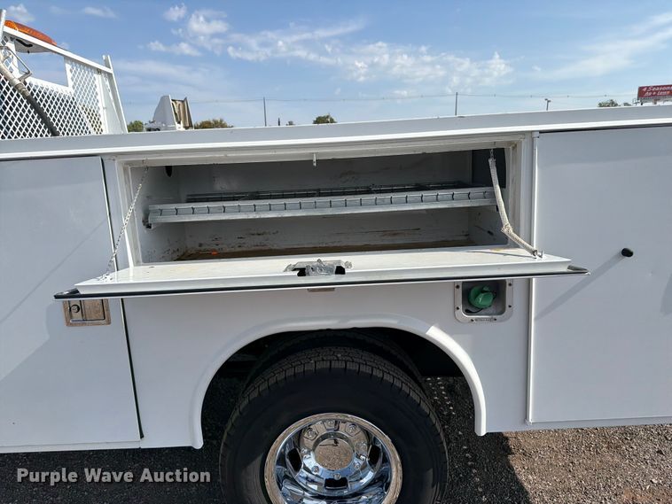 image for item FB5058 2019 RAM 3500 Heavy Duty Crew Cab utility bed pickup truck