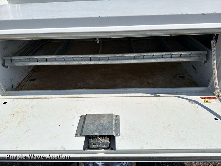 image for item FB5058 2019 RAM 3500 Heavy Duty Crew Cab utility bed pickup truck