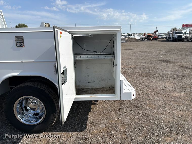 image for item FB5058 2019 RAM 3500 Heavy Duty Crew Cab utility bed pickup truck
