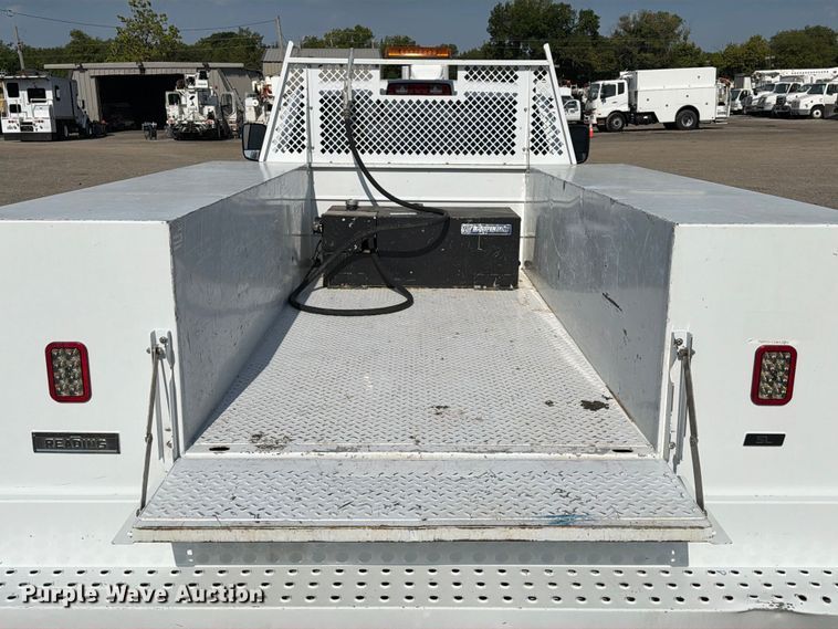 image for item FB5058 2019 RAM 3500 Heavy Duty Crew Cab utility bed pickup truck