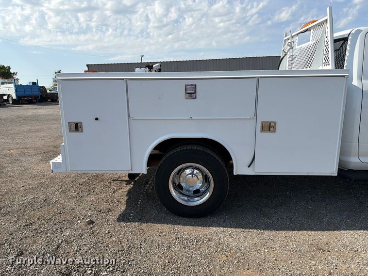 image for item FB5058 2019 RAM 3500 Heavy Duty Crew Cab utility bed pickup truck