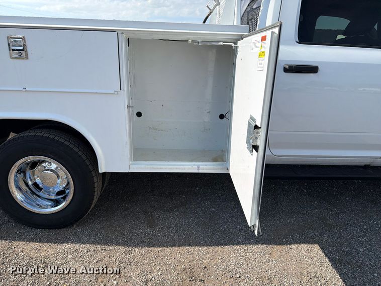 image for item FB5058 2019 RAM 3500 Heavy Duty Crew Cab utility bed pickup truck