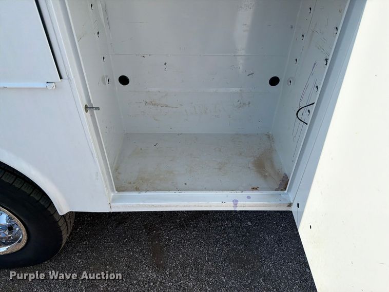 image for item FB5058 2019 RAM 3500 Heavy Duty Crew Cab utility bed pickup truck