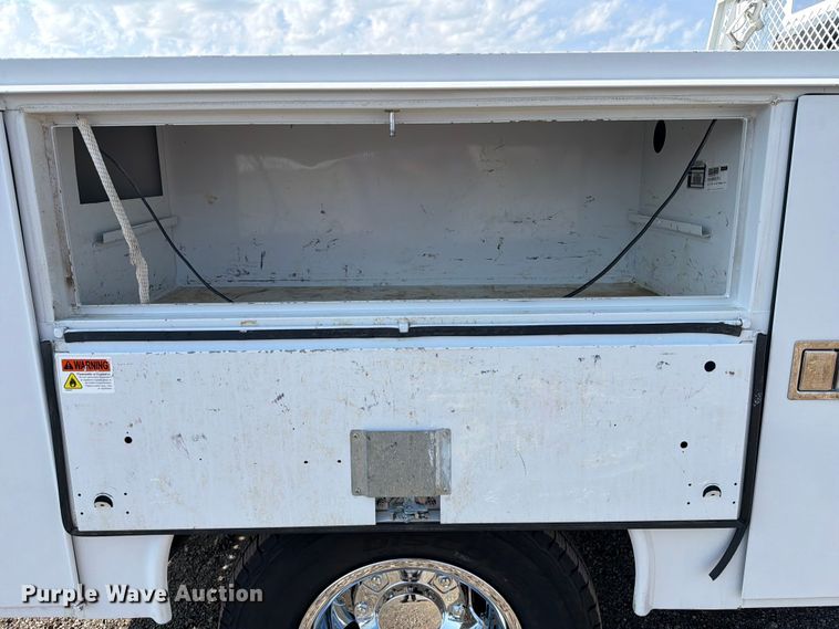 image for item FB5058 2019 RAM 3500 Heavy Duty Crew Cab utility bed pickup truck