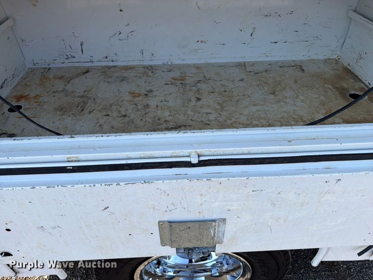 image for item FB5058 2019 RAM 3500 Heavy Duty Crew Cab utility bed pickup truck