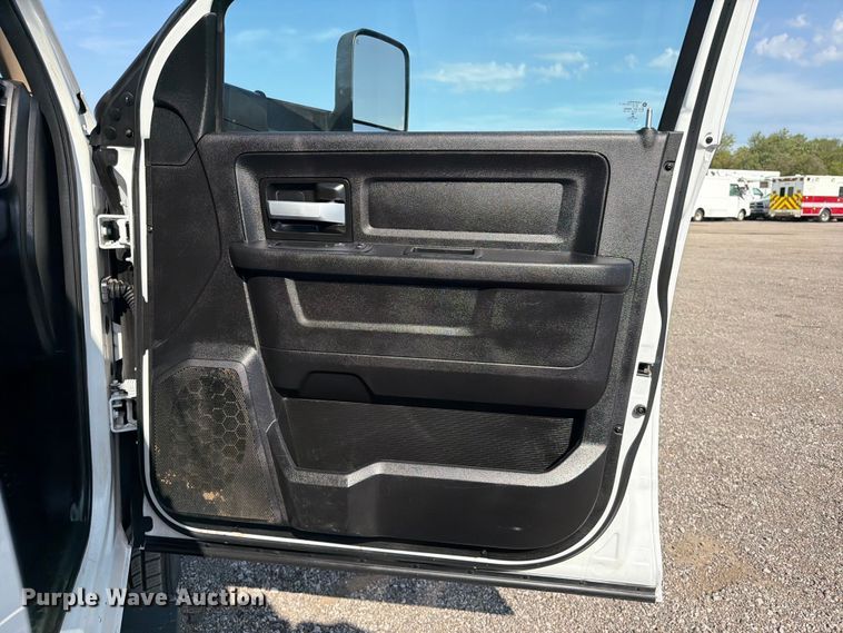image for item FB5058 2019 RAM 3500 Heavy Duty Crew Cab utility bed pickup truck