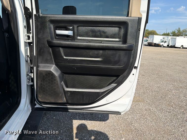 image for item FB5058 2019 RAM 3500 Heavy Duty Crew Cab utility bed pickup truck