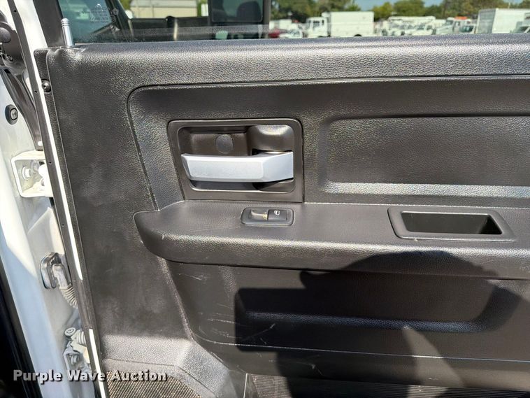 image for item FB5058 2019 RAM 3500 Heavy Duty Crew Cab utility bed pickup truck