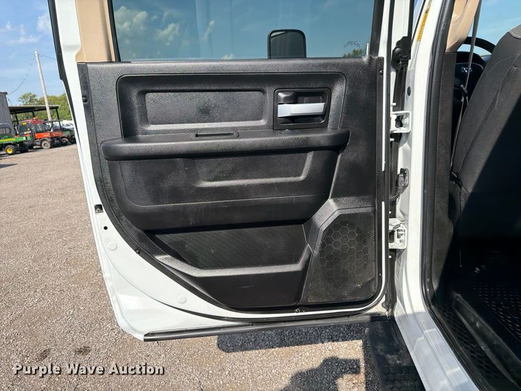 image for item FB5058 2019 RAM 3500 Heavy Duty Crew Cab utility bed pickup truck