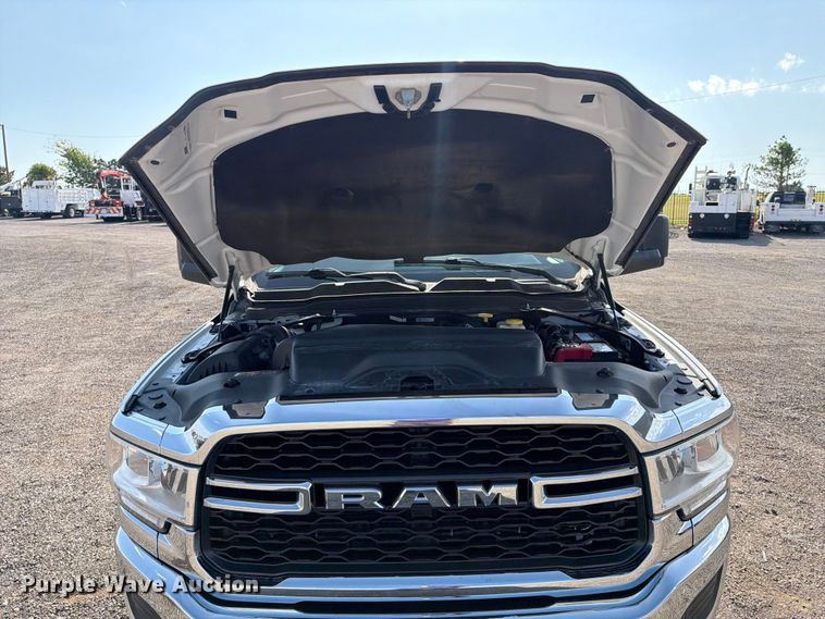 image for item FB5058 2019 RAM 3500 Heavy Duty Crew Cab utility bed pickup truck