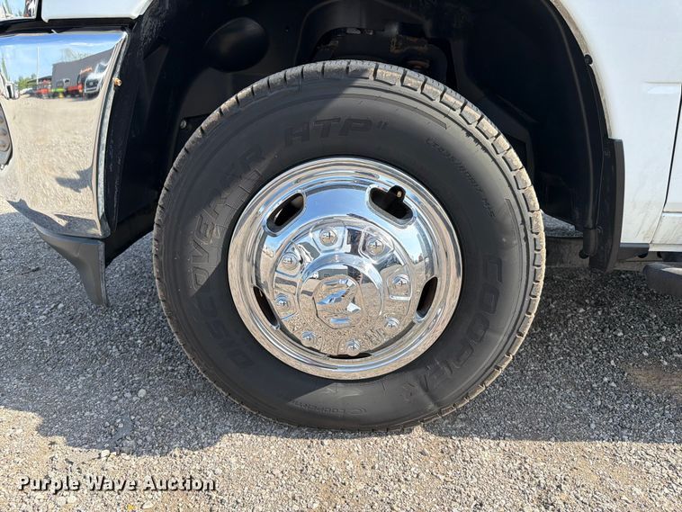 image for item FB5058 2019 RAM 3500 Heavy Duty Crew Cab utility bed pickup truck