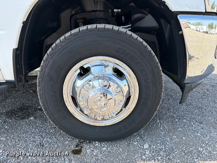 image for item FB5058 2019 RAM 3500 Heavy Duty Crew Cab utility bed pickup truck