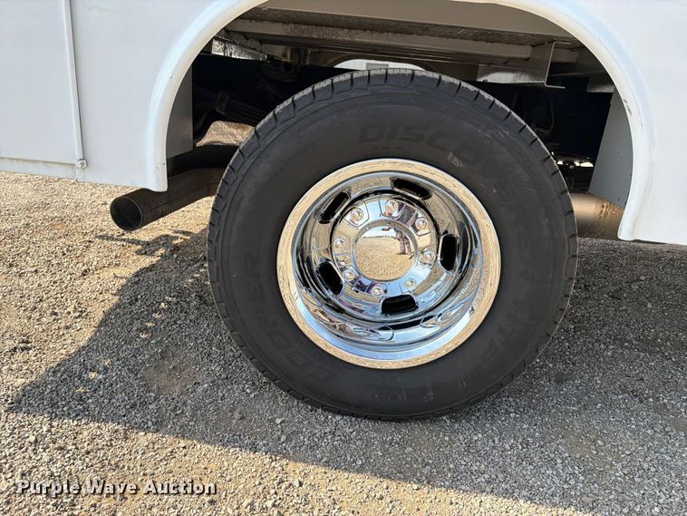 image for item FB5058 2019 RAM 3500 Heavy Duty Crew Cab utility bed pickup truck