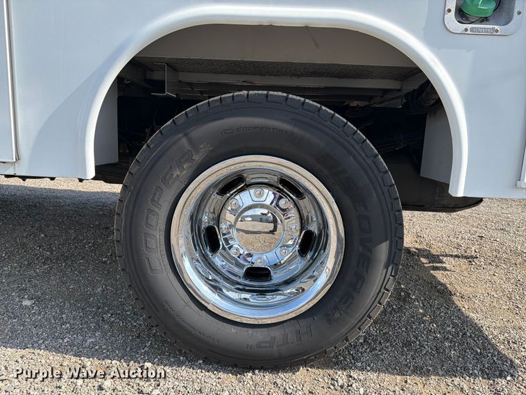 image for item FB5058 2019 RAM 3500 Heavy Duty Crew Cab utility bed pickup truck