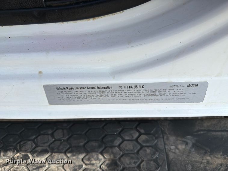 image for item FB5058 2019 RAM 3500 Heavy Duty Crew Cab utility bed pickup truck