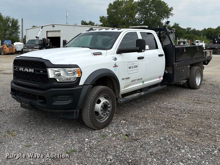 image for item FN5798 2022 RAM 5500 Crew Cab flatbed truck