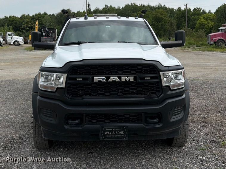 image for item FN5798 2022 RAM 5500 Crew Cab flatbed truck