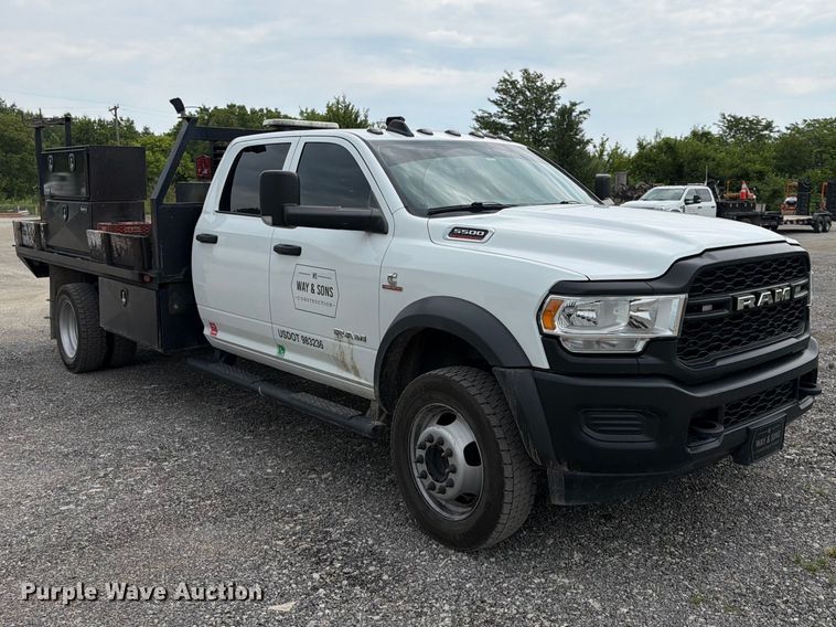 image for item FN5798 2022 RAM 5500 Crew Cab flatbed truck