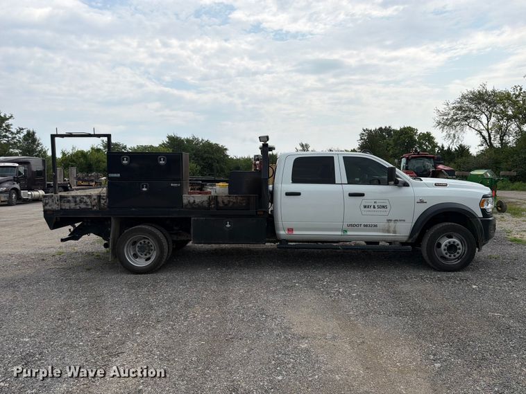 image for item FN5798 2022 RAM 5500 Crew Cab flatbed truck