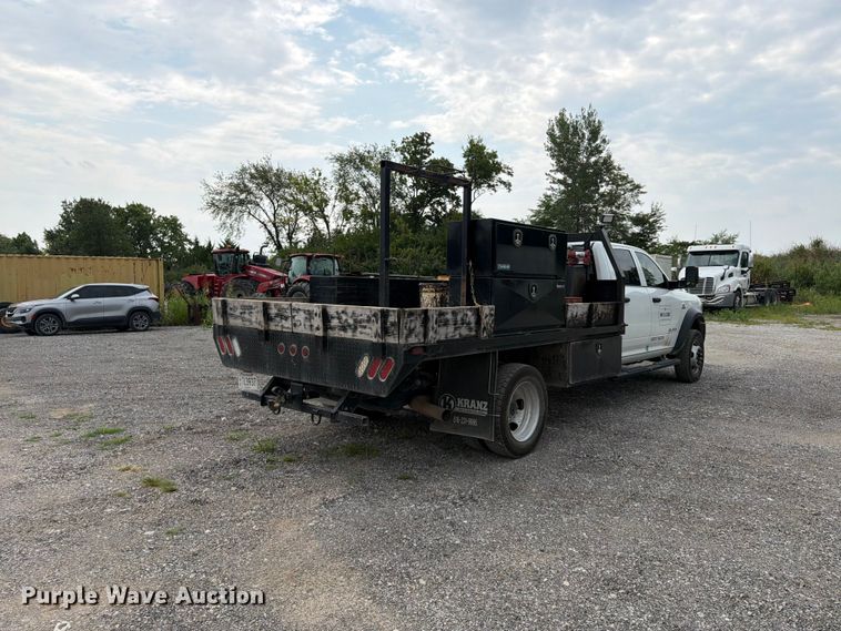 image for item FN5798 2022 RAM 5500 Crew Cab flatbed truck
