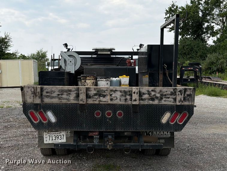 image for item FN5798 2022 RAM 5500 Crew Cab flatbed truck